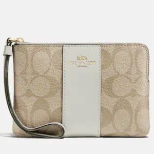 Coach Corner Zip Wristlet In Signature Canvas